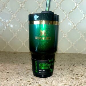 Green and Black Stanley X Wicked 20z Quencher Tumbler.